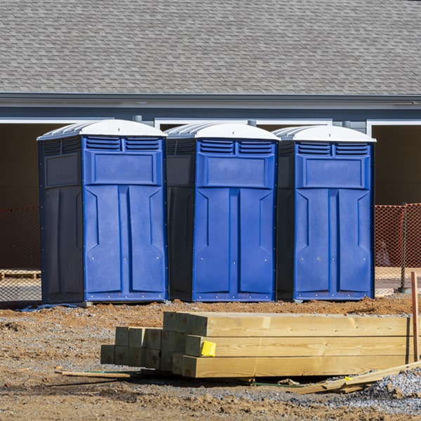 what is the cost difference between standard and deluxe porta potty rentals in Harpersfield